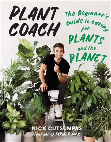 book cover image of a man smiling at viewer, surrounded by houseplants. Grey background with black and green text in handwriting style sans serif font