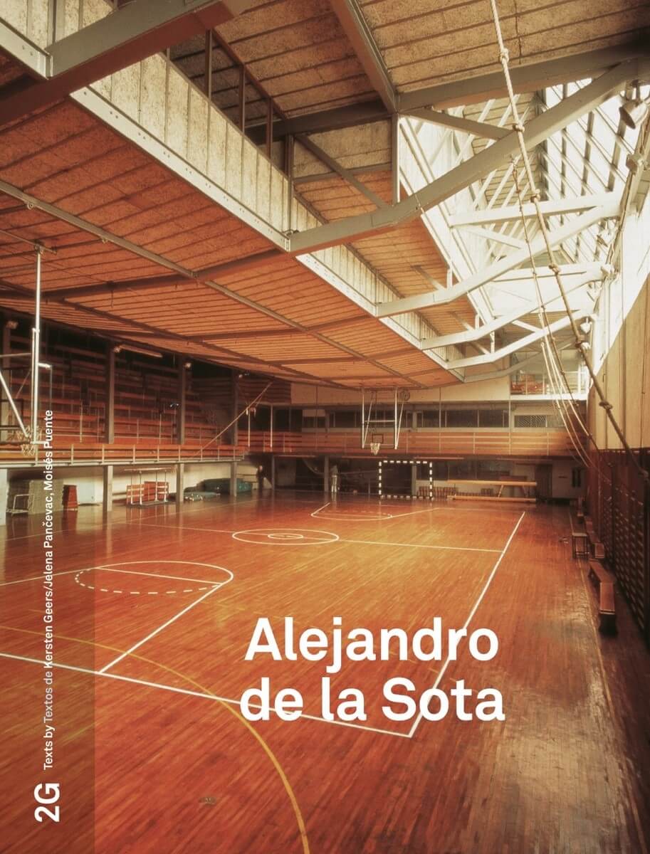 Book cover featuring photograph of wooden interior of basketball hall, beams and roof visible. Title printed in bottom,centre in white sans serif font