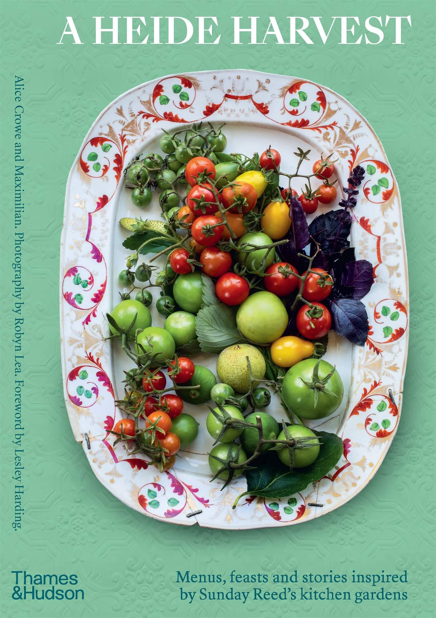 book cover featuring a pleate of colourful tomatos on a mint green background